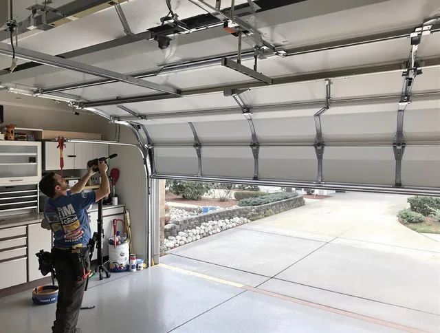 Garage door track repair service by Montclair Garage Door Repair in Montclair